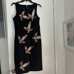 Stunning dress with glittering birds.